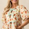 Beyond Compare Ecru Floral Cotton Bow Front Peplum Top