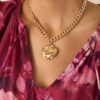 Breaking Through Gold Flower Pendant Necklace