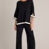 Bold Symphony Split Hem Black Sweater Pants